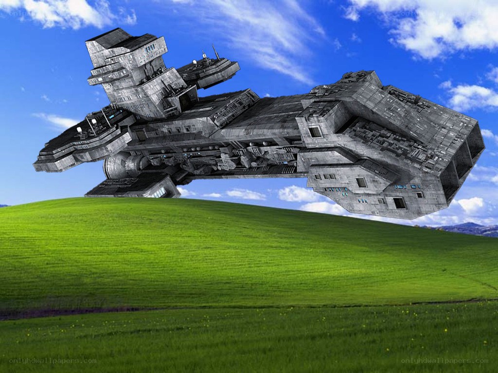 spaceship over green hill