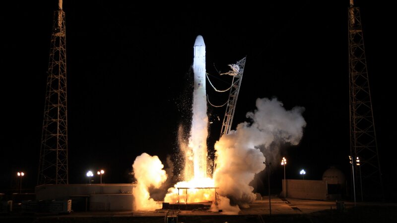 SpaceX rocket launch at night