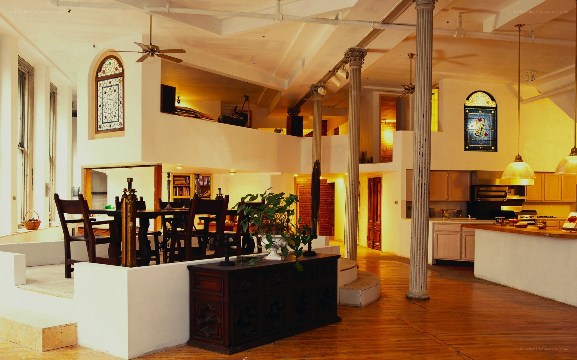 Spacious loft interior with stained glass