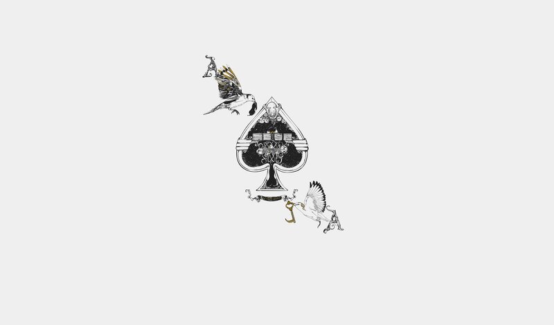 spade with birds and key