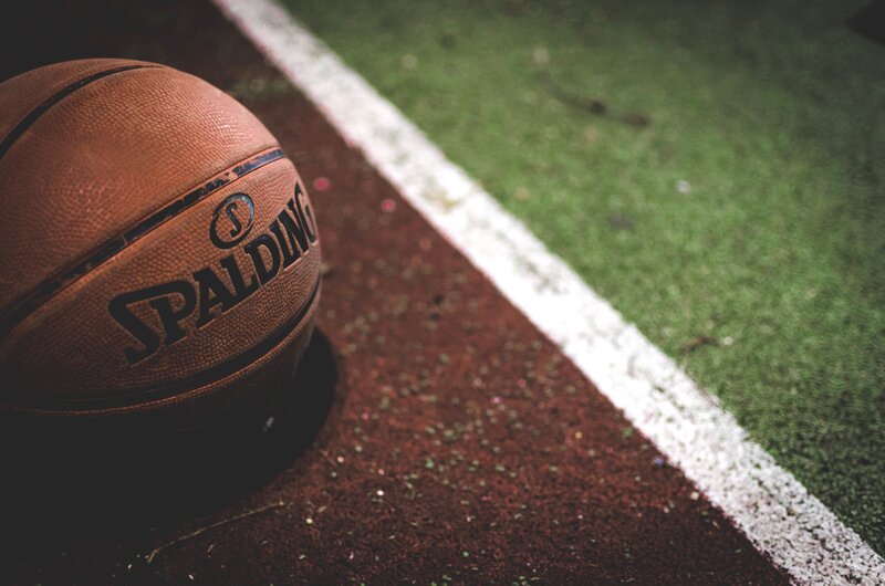 Spalding basketball on court