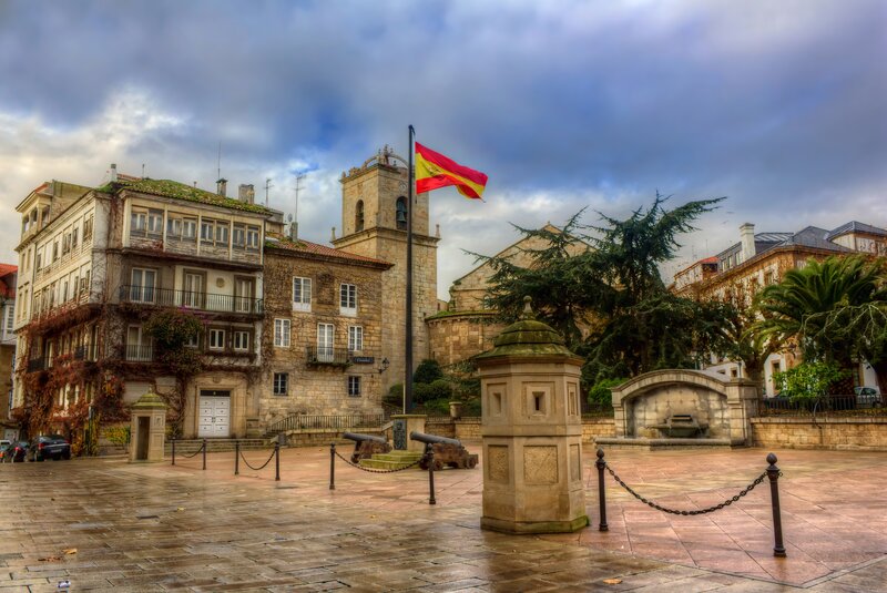 Spanish flag in historic town square