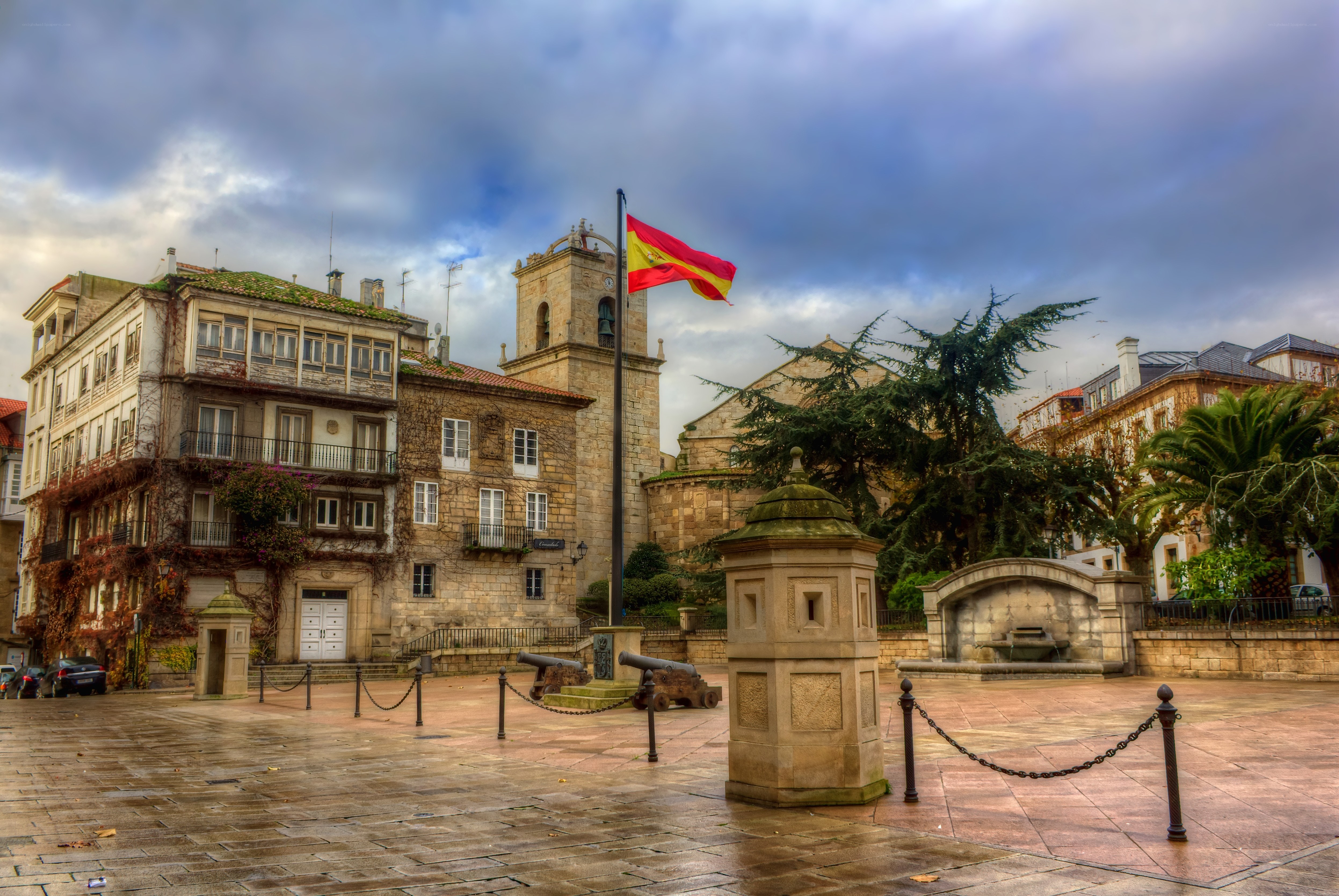 Spanish flag in historic town square
