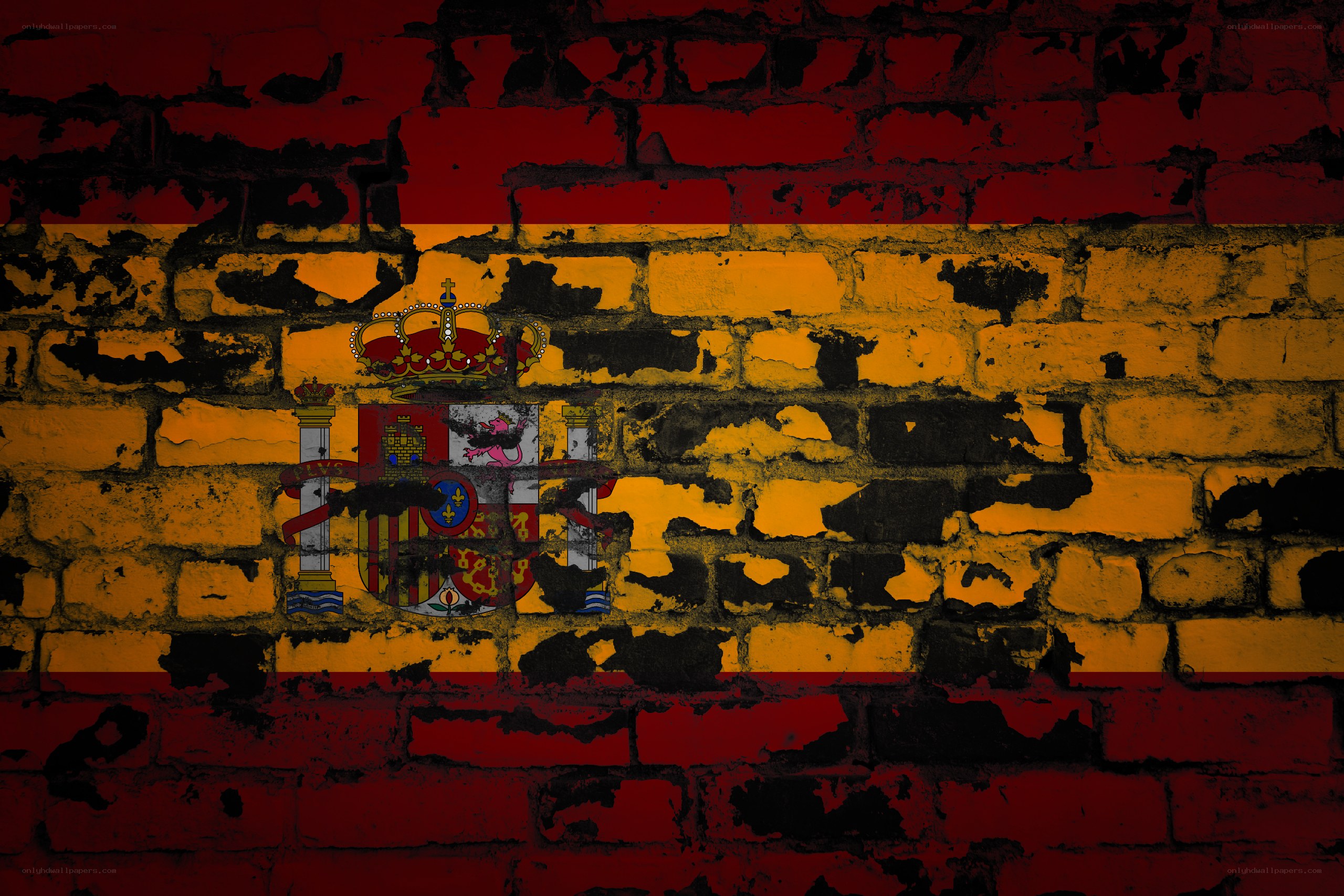 Spanish flag on brick wall