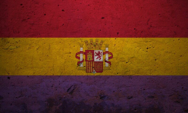 Spanish flag on textured wall