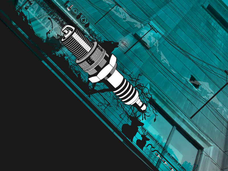 Spark plug art on city window