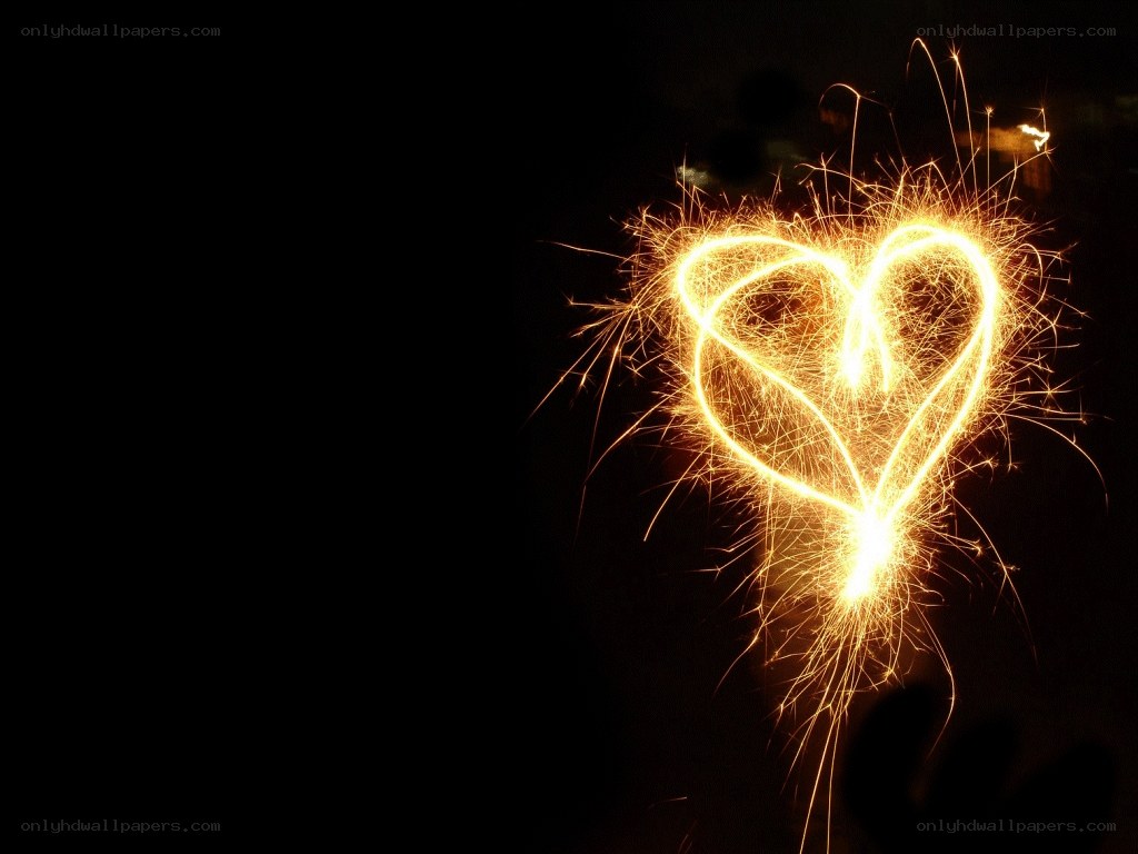Sparkler heart in darkness