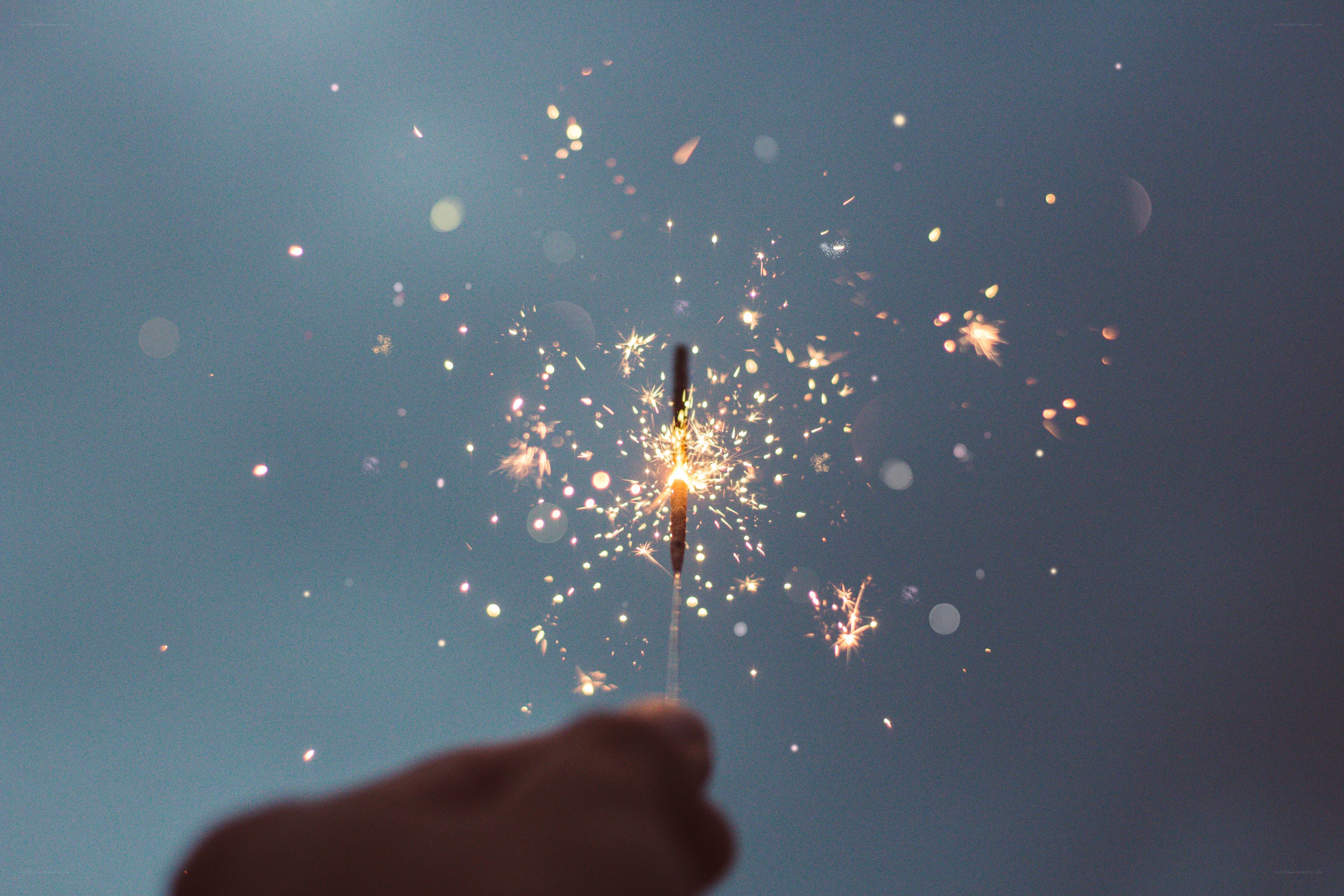 sparkler in hand at dusk