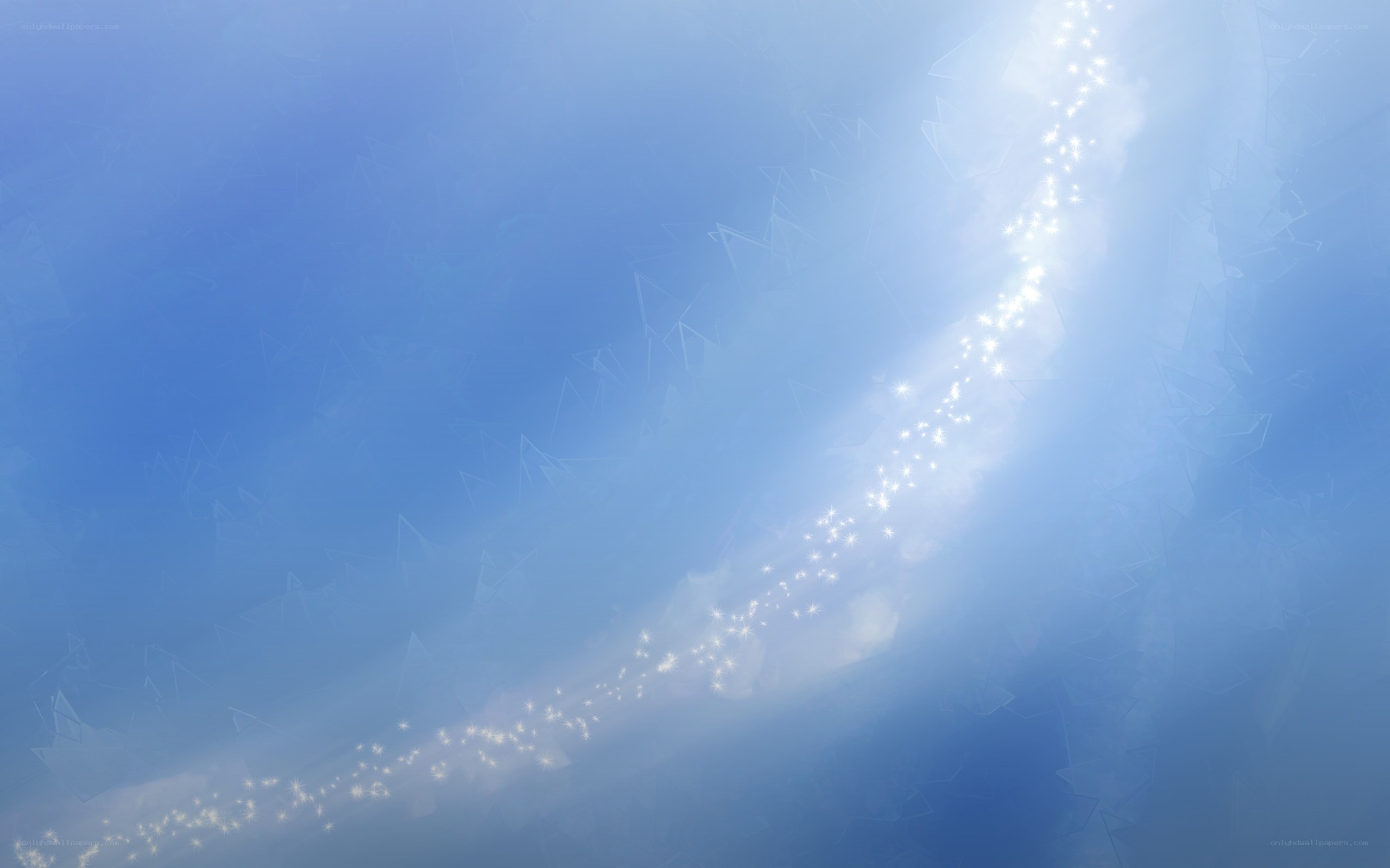 sparkling light trail in blue sky