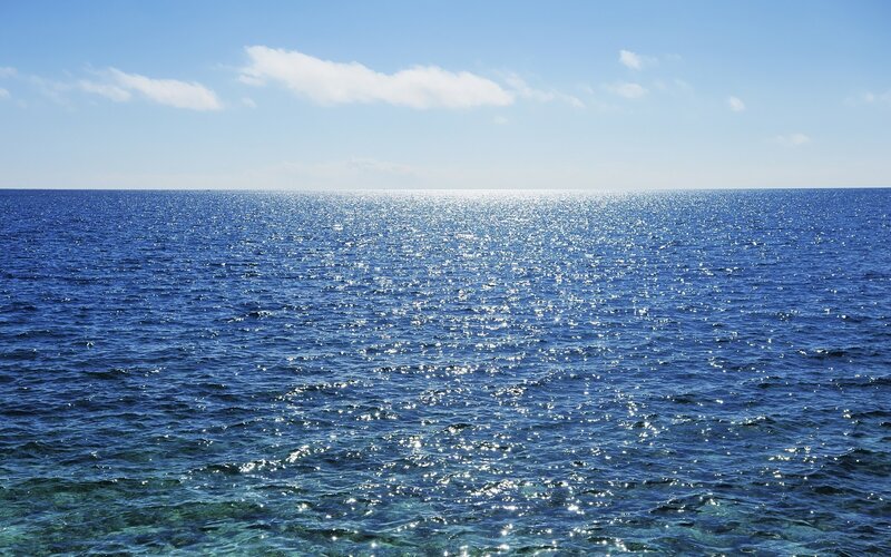 Sparkling Ocean Surface — Sky