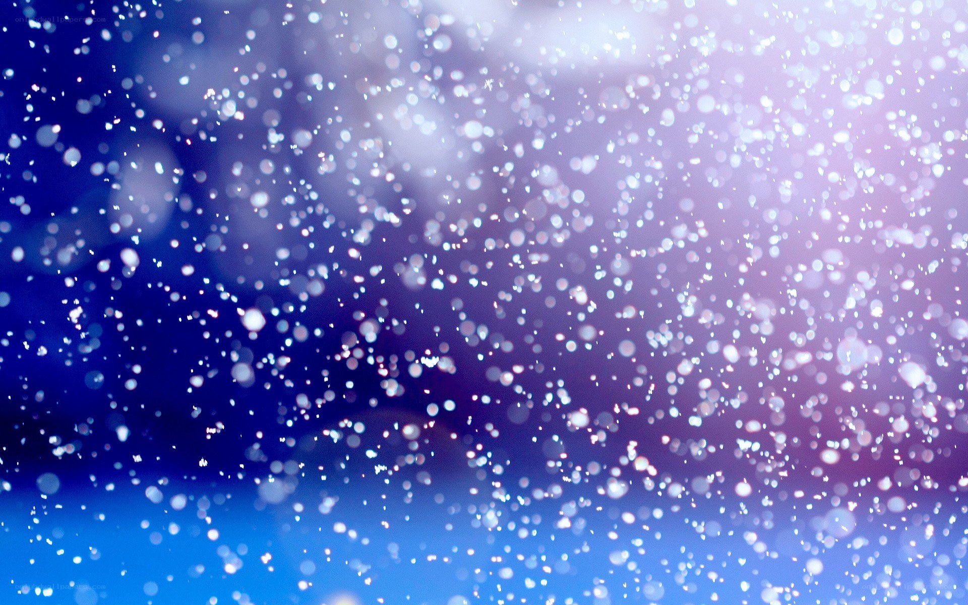sparkling particles in blue light