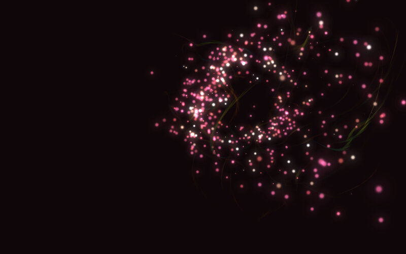 sparkling particles on dark background