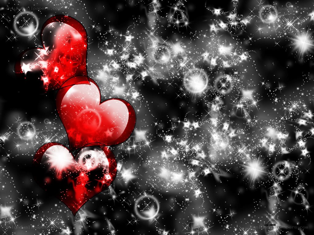 sparkling red hearts on black