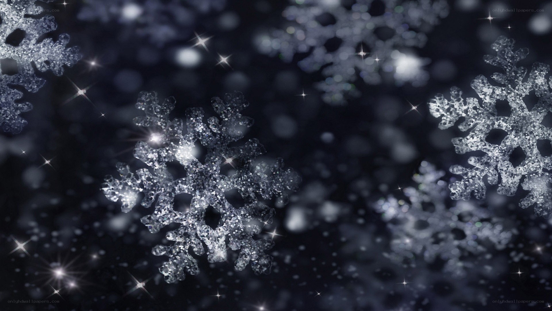 sparkling snowflakes in dark sky