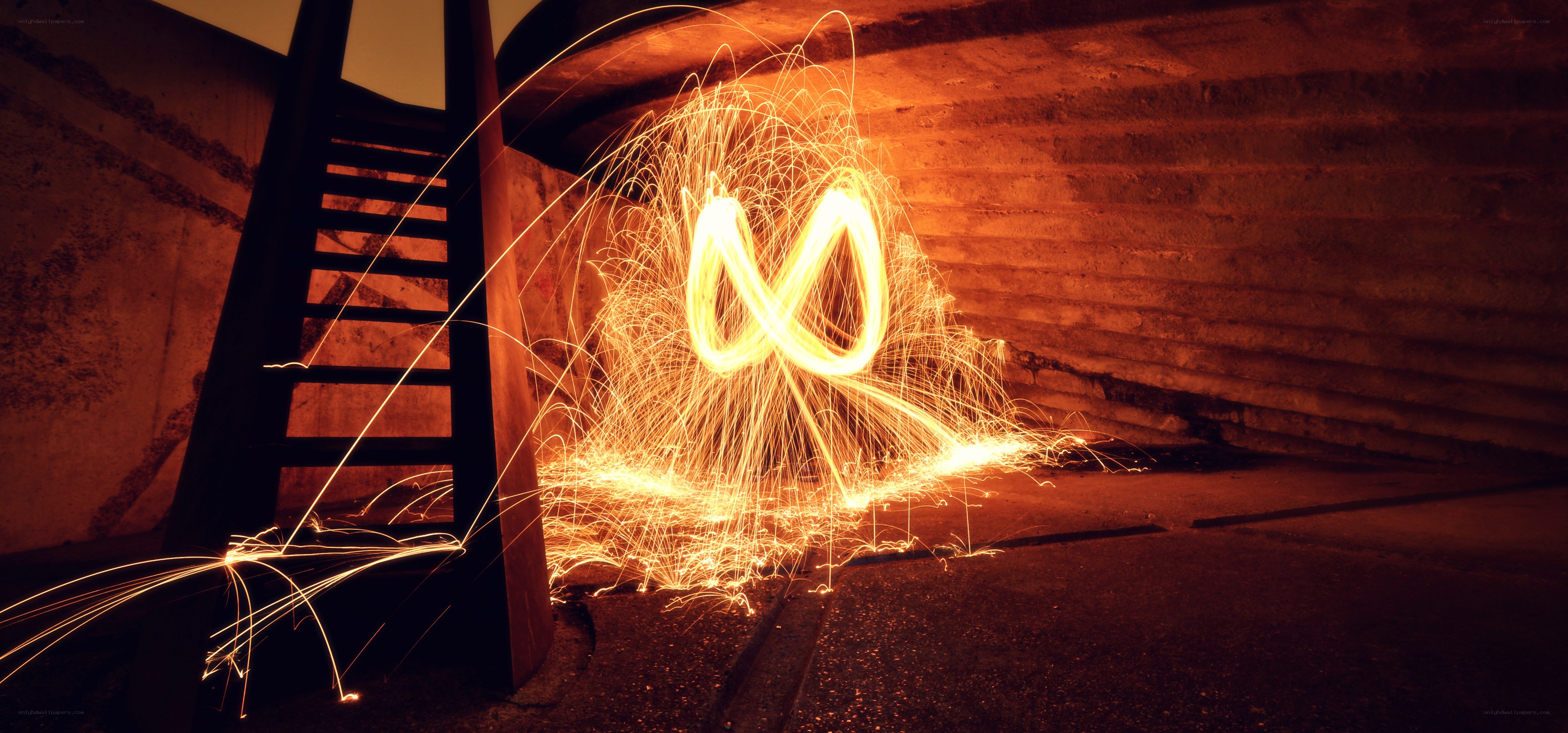 Sparks forming infinity symbol