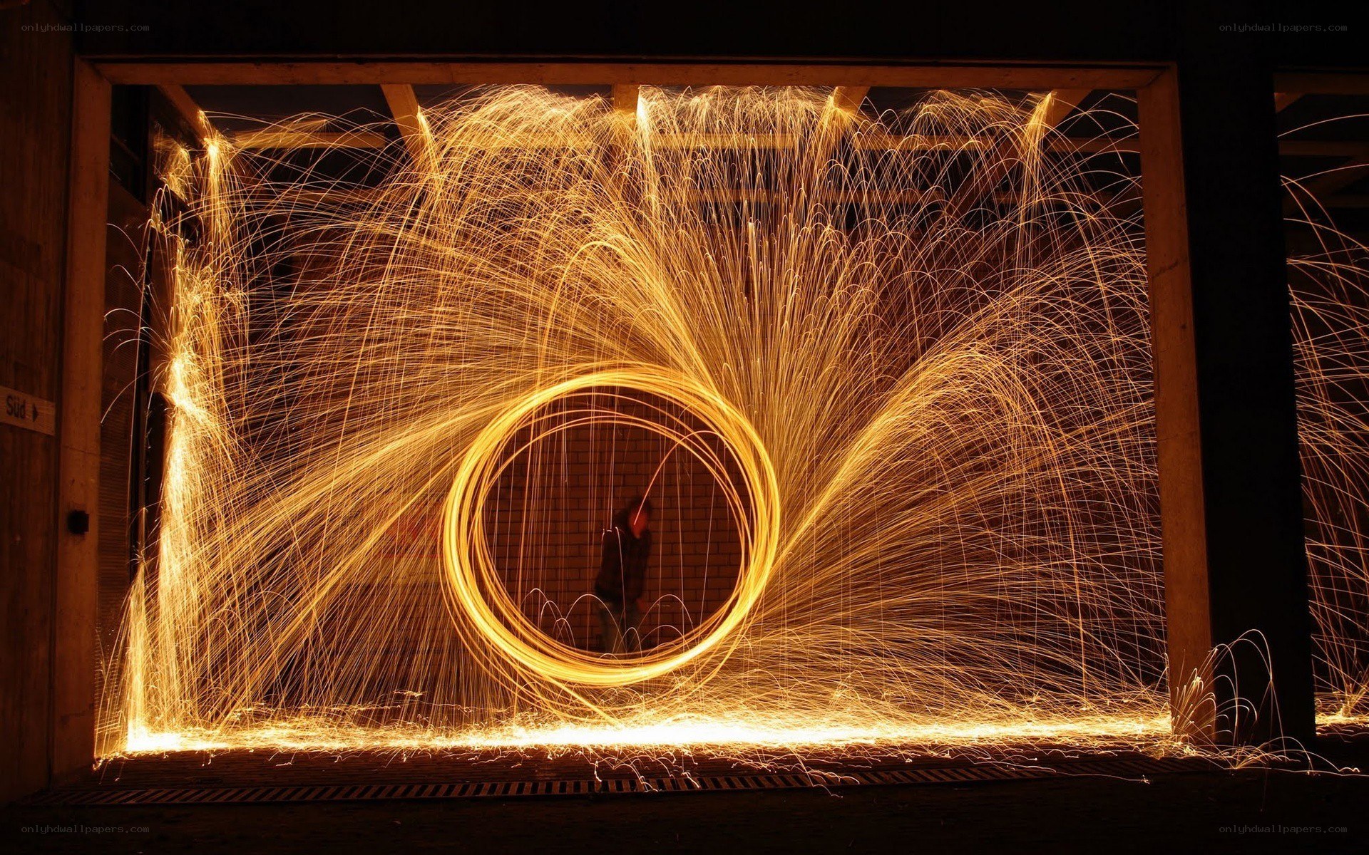 Sparks from steel wool spinning