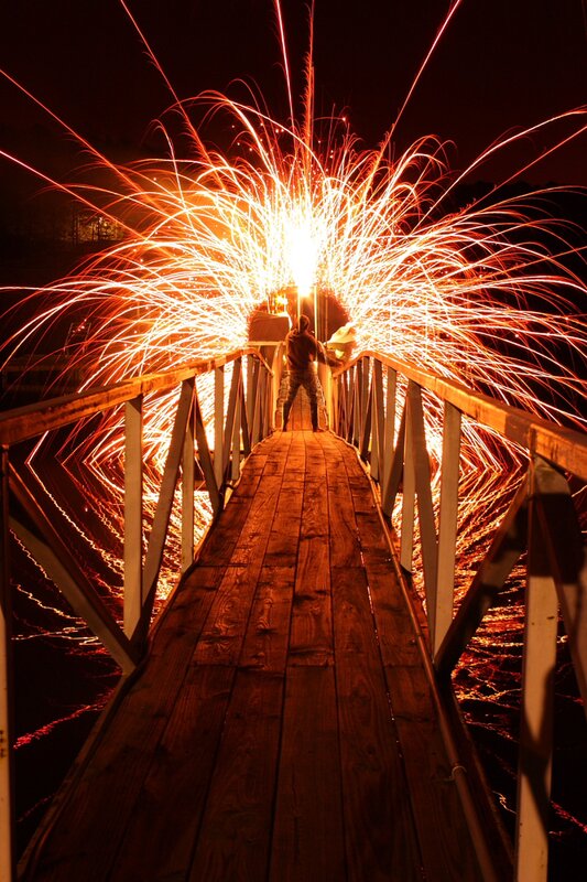 Sparks on a wooden bridge