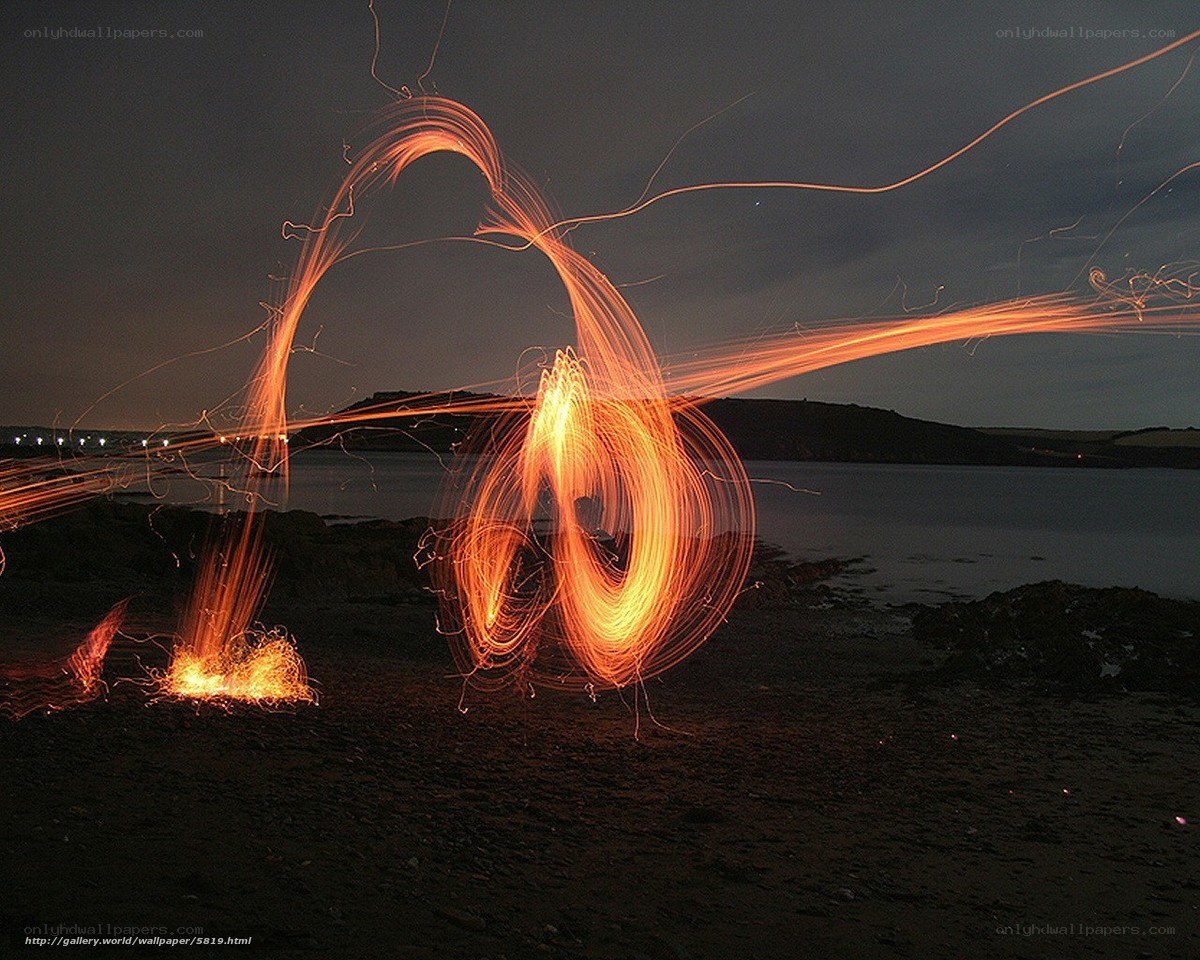 Sparks on the beach at night