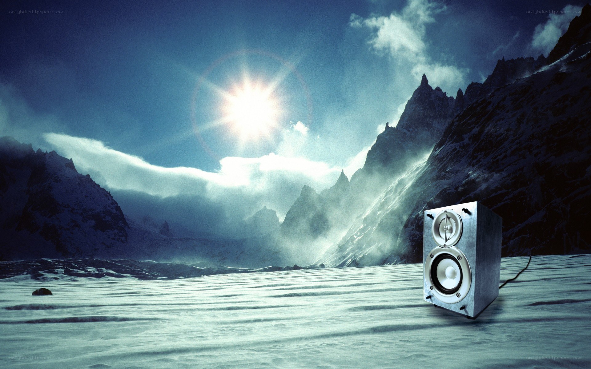 Speaker in snowy mountain landscape