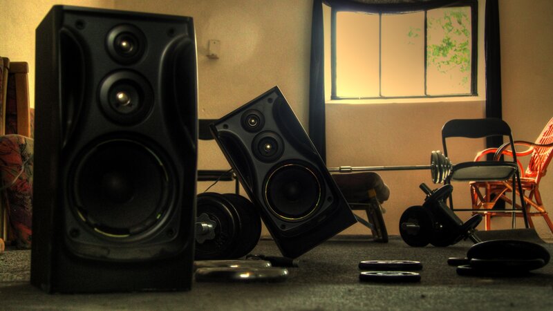 Speakers and gym equipment in room