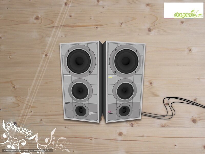 speakers on wooden surface