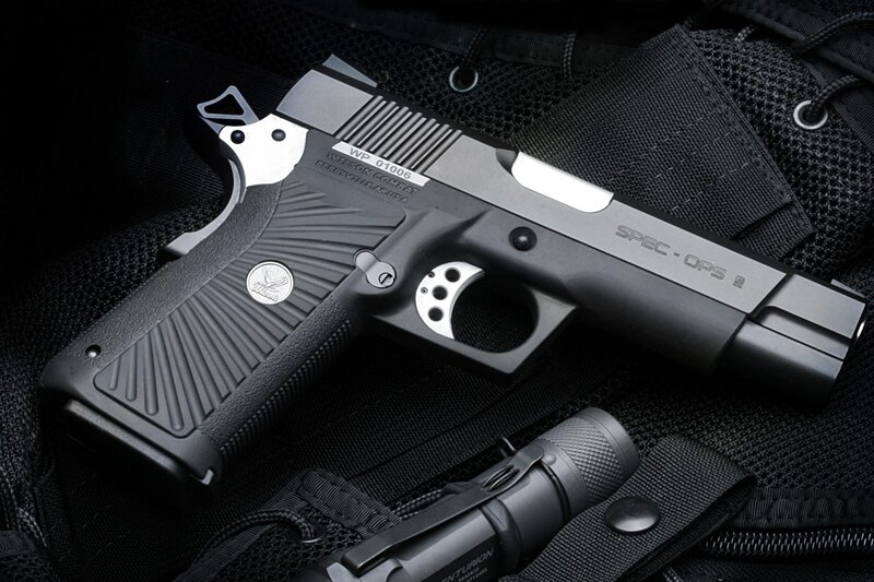 Spec Ops pistol on tactical gear