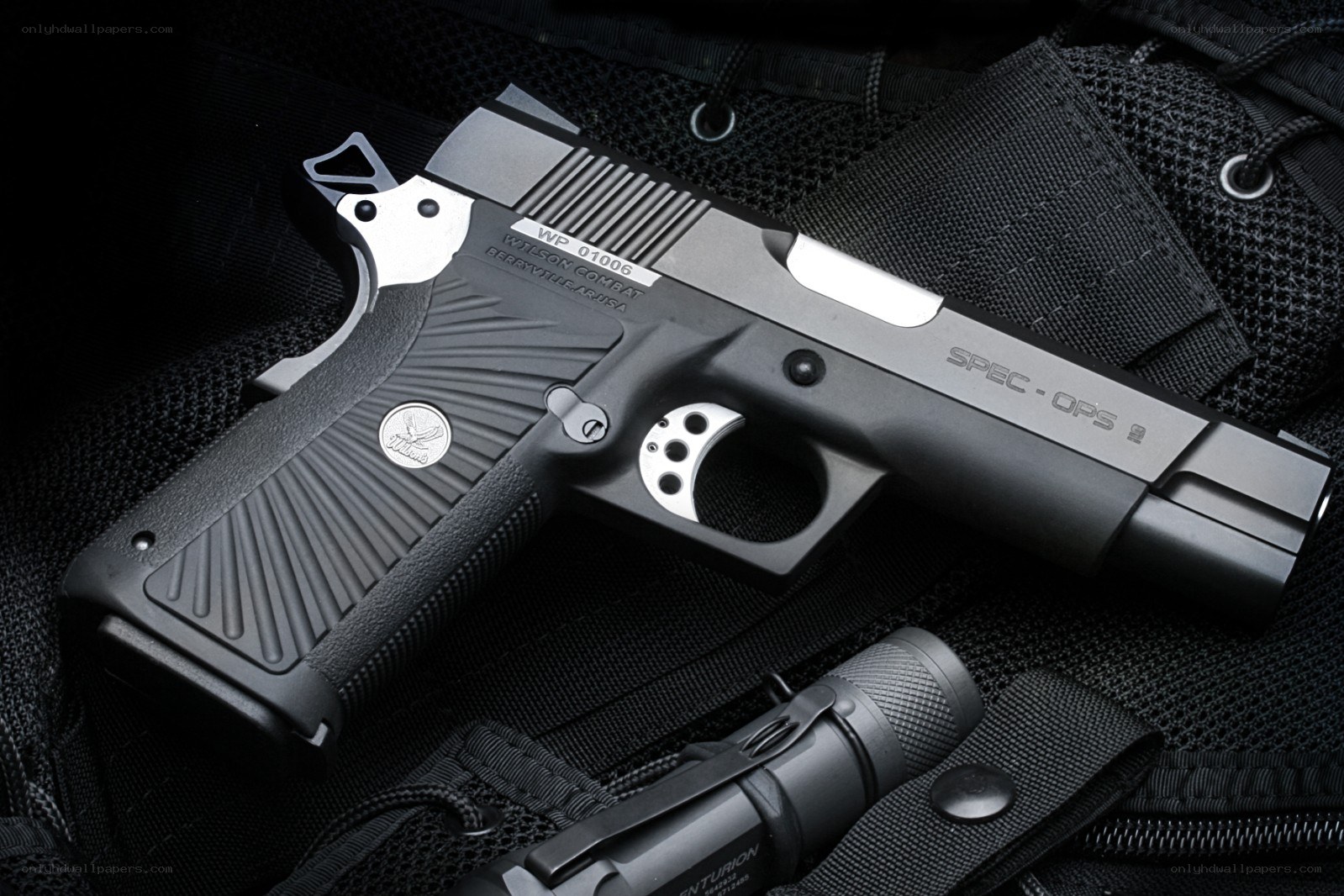Spec Ops pistol on tactical gear