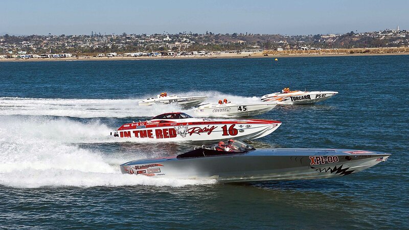 Speed boats racing on water