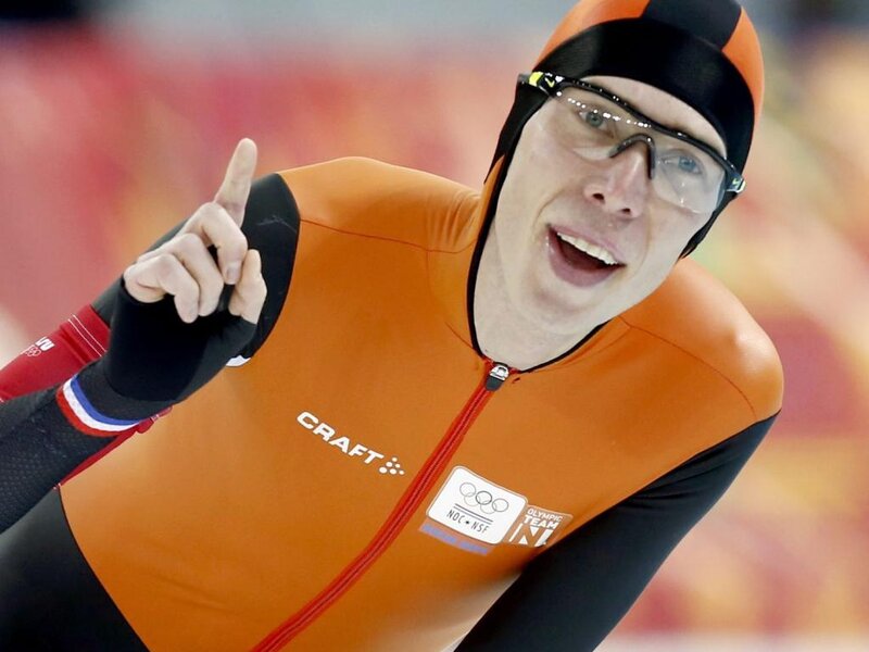 Speed Skater Celebrating — Orange, Celebratory, Photograph, Glasses