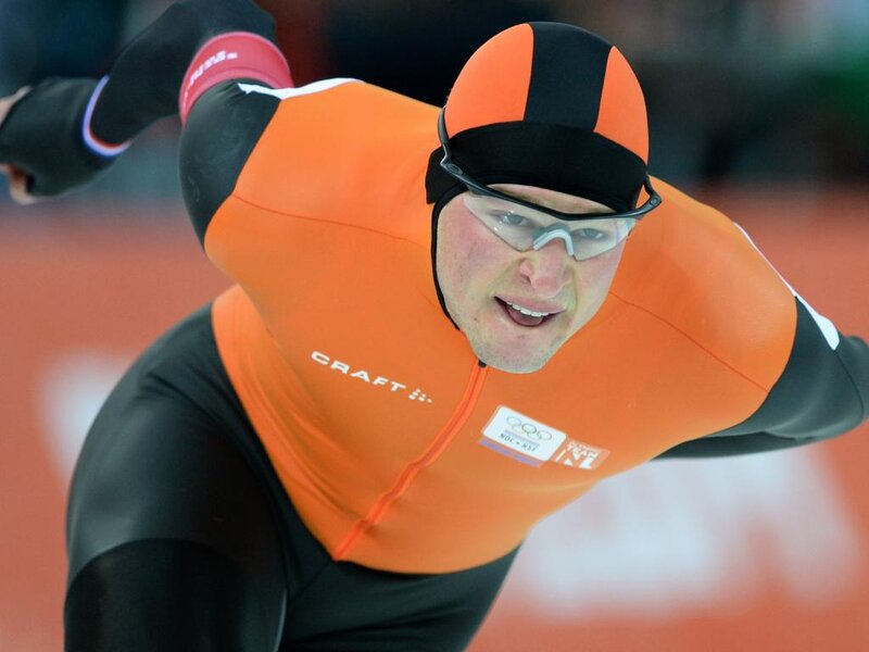 Speed Skater in Action — Orange, Intense, Photograph, Goggles