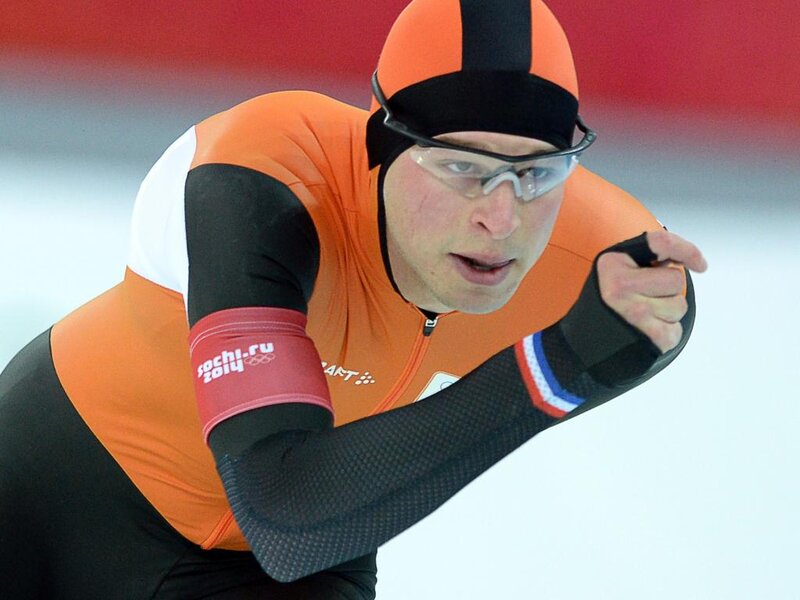 Speed Skater in Action — Orange, Intense