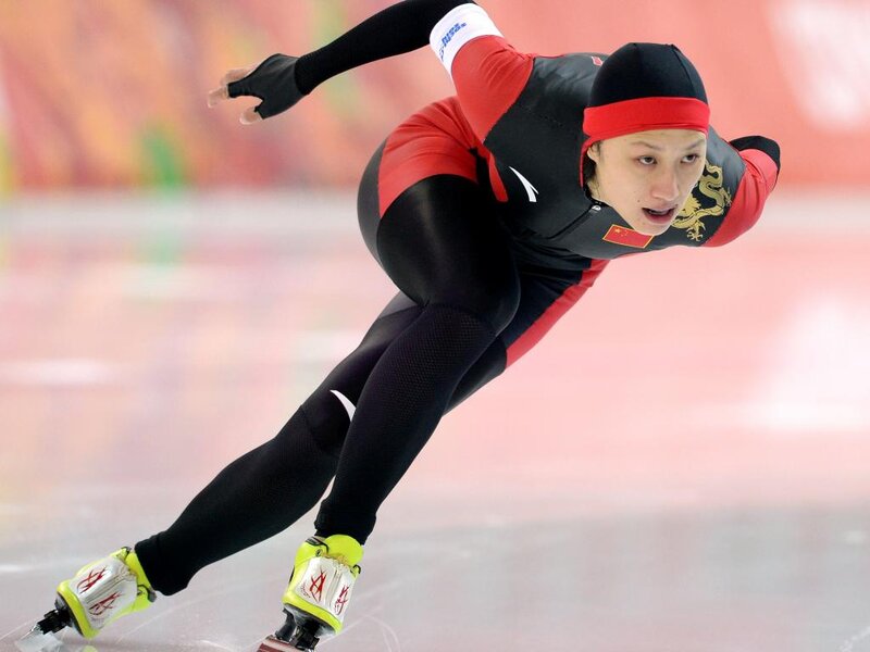 Speed Skater in Motion — Black, Intense, Photograph
