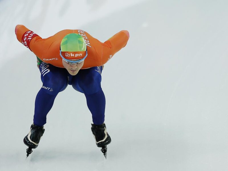 Speed Skater in Motion — Orange