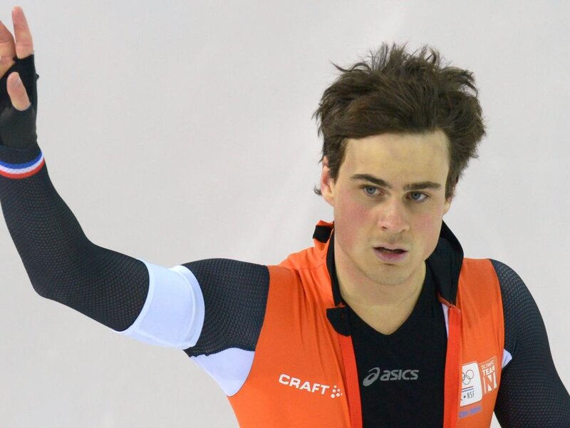 Speed Skater in Orange Suit — Focused, Photograph, Orange Vest