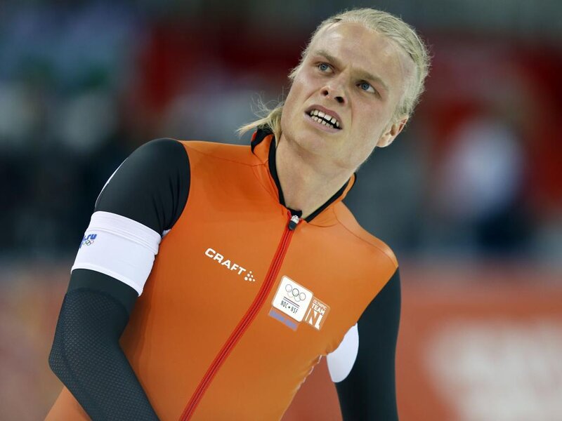 Speed Skater in Orange Suit — Intense, Photograph, Orange Suit