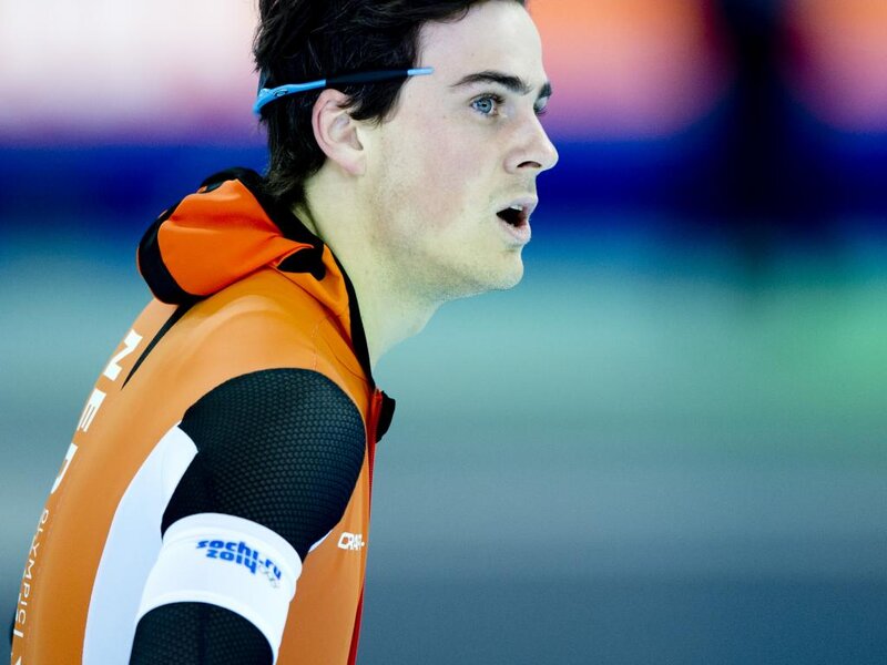 Speed Skater in Orange Suit — Intense, Photograph, Sunglasses