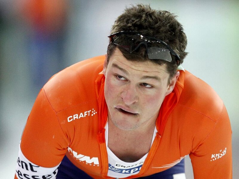 Speed Skater in Orange Suit — Intense