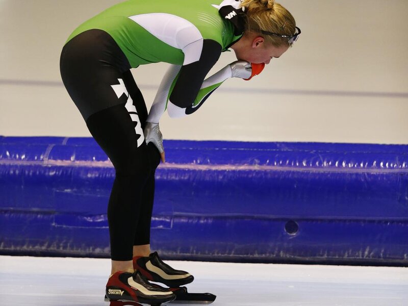 Speed Skater on Ice — Green, Focused