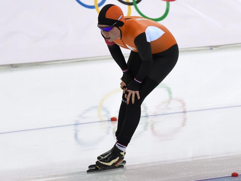 Speed Skater on Ice — Orange, Focused