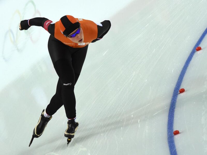 Speed Skater on Ice — Orange, Intense