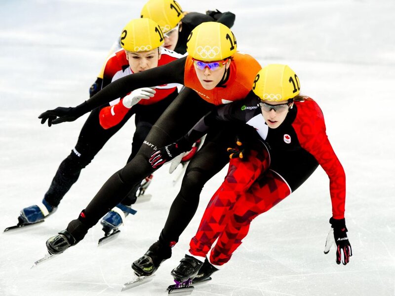 Speed Skaters in Action — Yellow