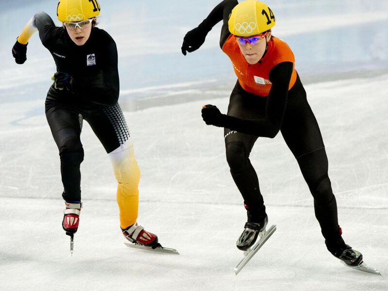 Speed Skaters on Ice — Black, Intense, Photograph