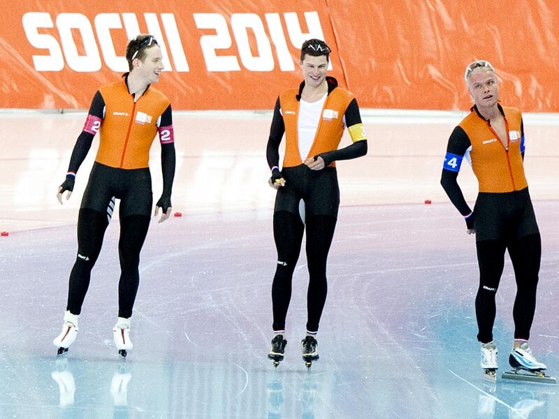Speed Skaters on Ice — Orange, Competitive