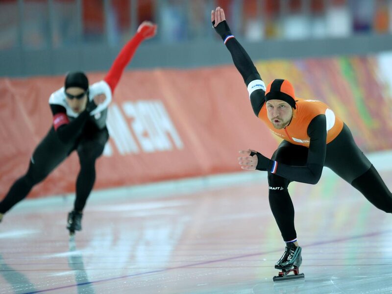 Speed Skaters on Ice — Orange, Intense