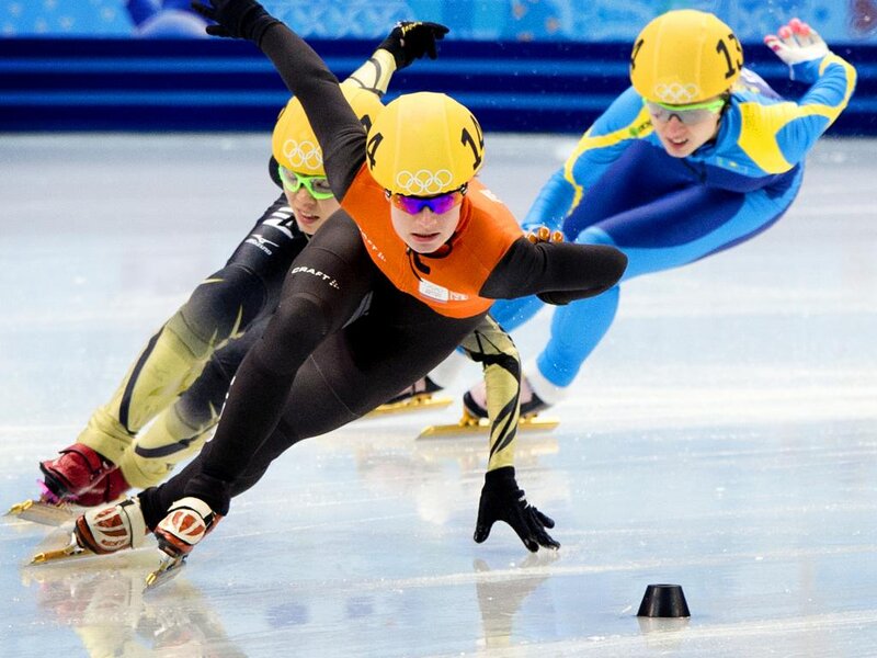 Speed Skaters on Ice — Yellow