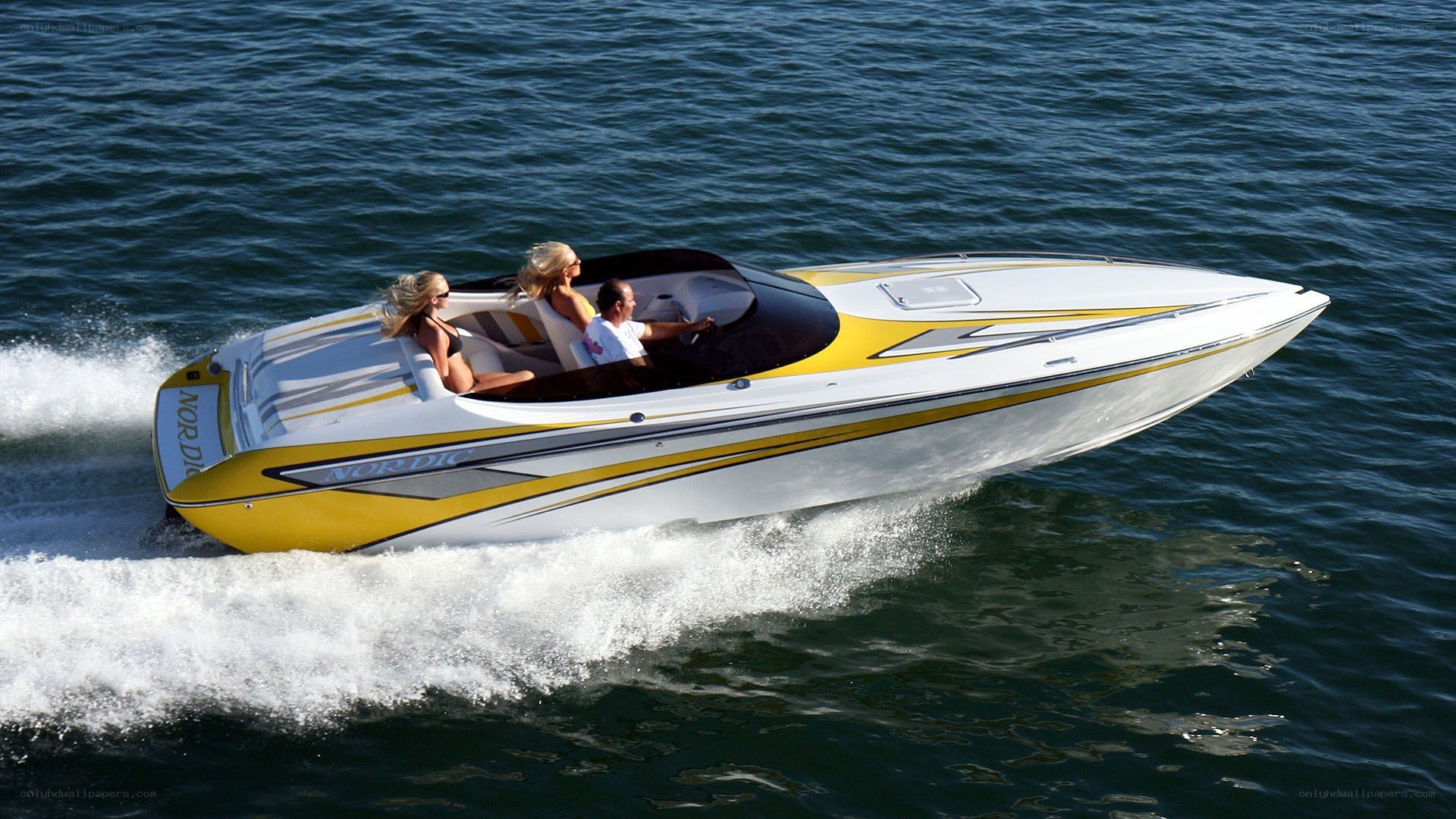 Speedboat with passengers on water