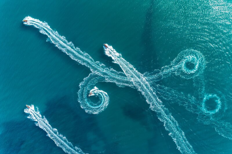 Speedboats on Water — Blue