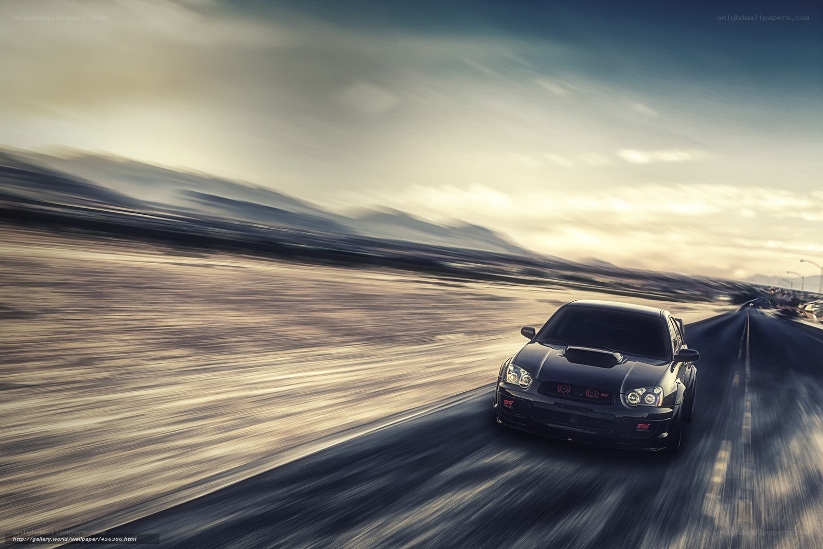 Speeding car on open road