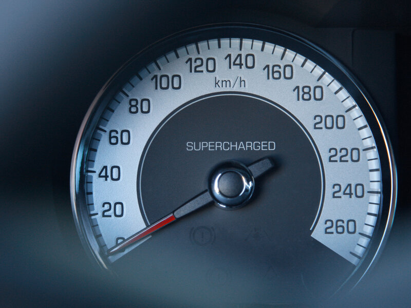 speedometer with supercharged label