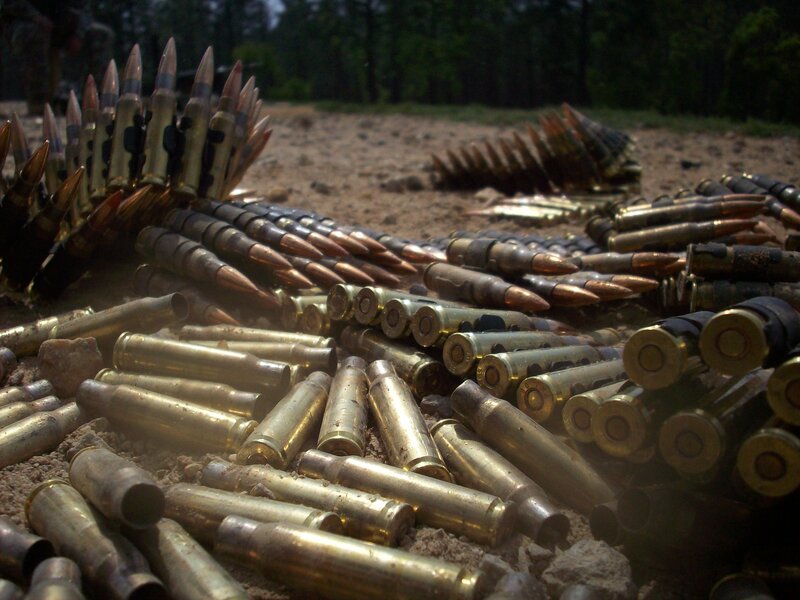 Spent ammunition casings on ground